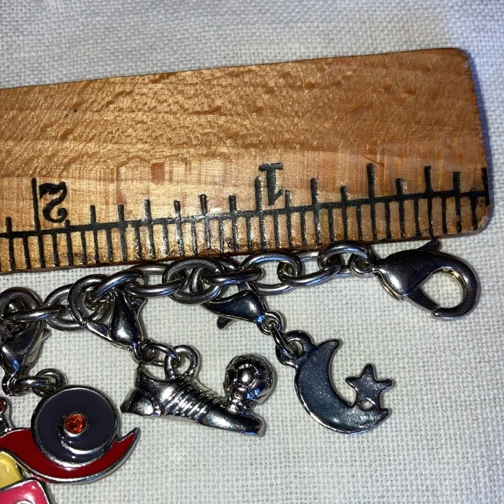 VTG st charm bracelet loaded w/cute bright enameled colors, 8” chain. $45 - Picture 3 of 7